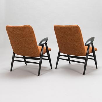 Ilmari Tapiovaara, a pair of mid-20th-century '2468', 'Eve' armchairs for Asko.