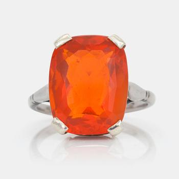 574. A circa 6.00 cts fire opal ring.