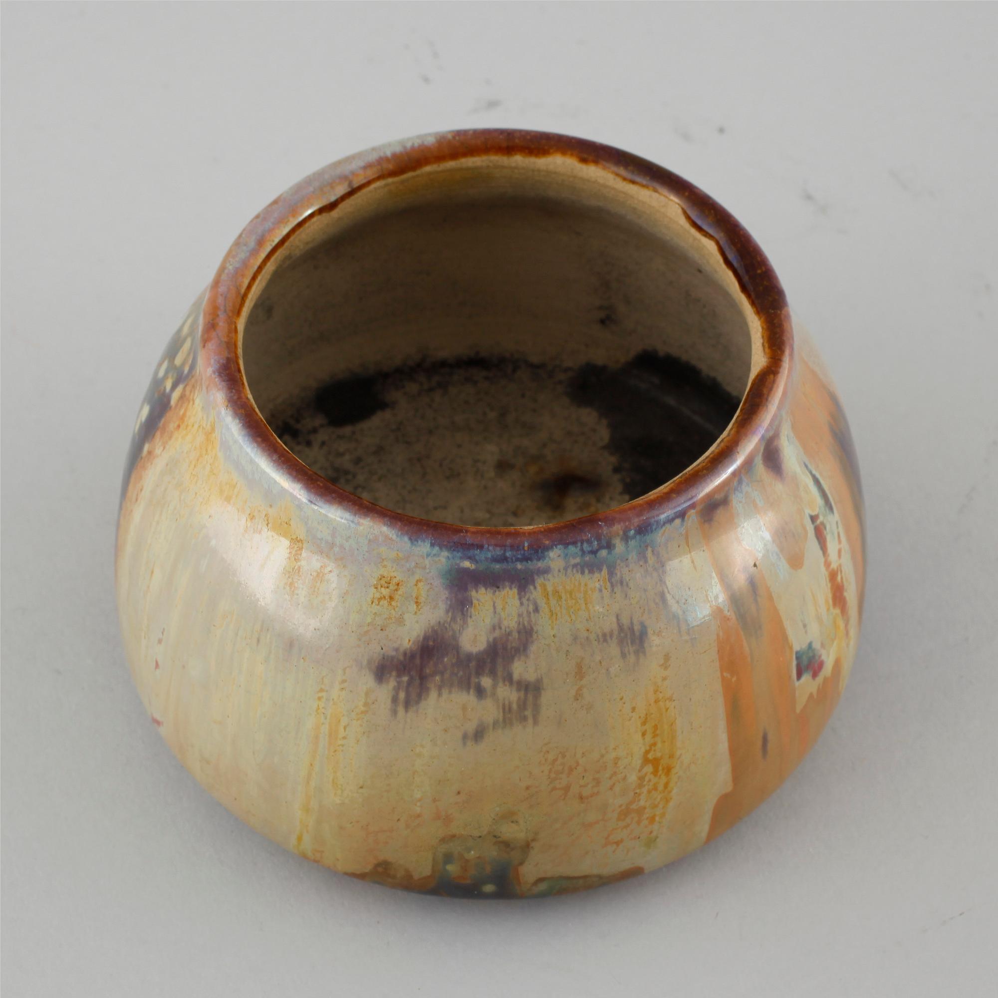 A signed ceramic bowl by Clement Massier, Golfe Juan, first half of the 20th century.