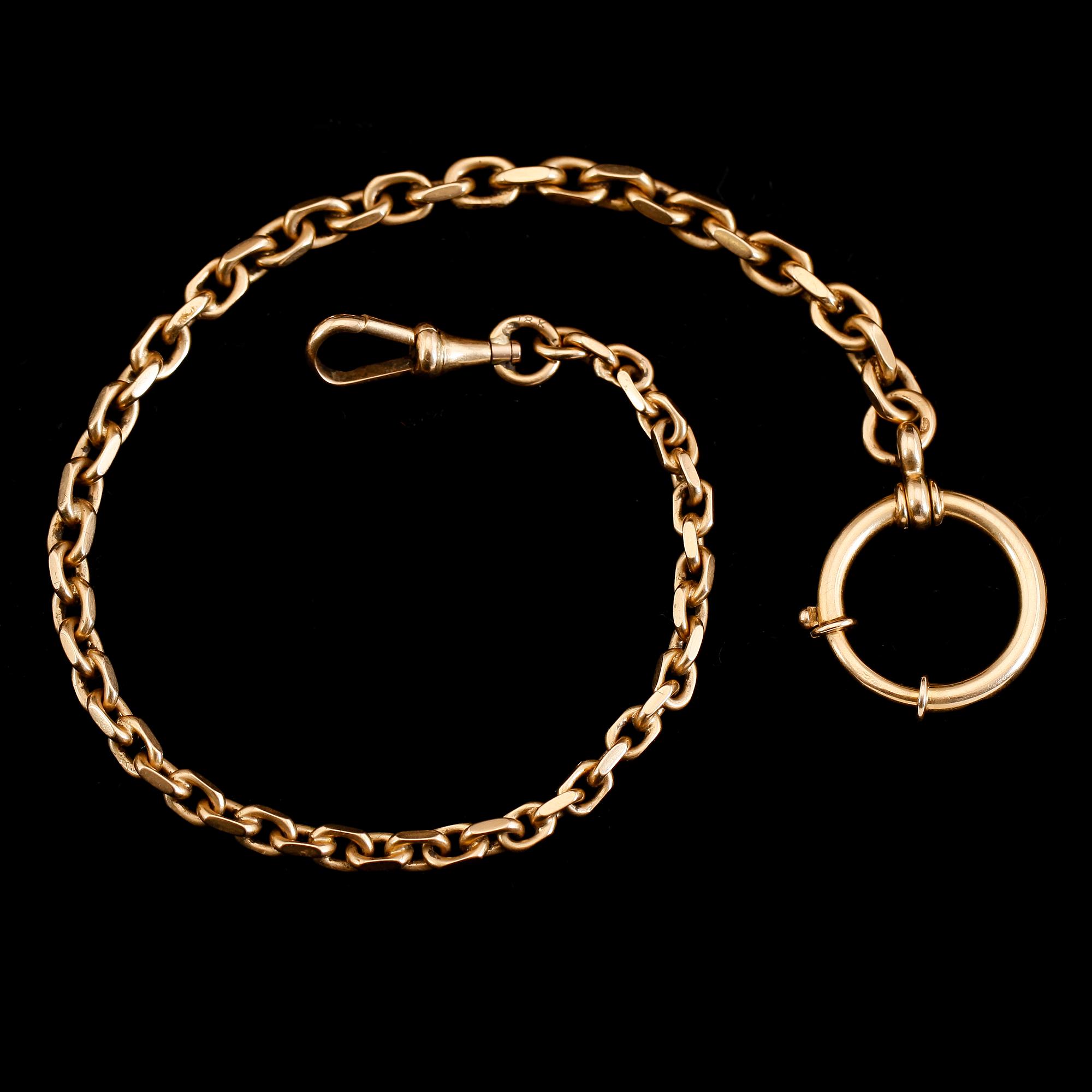 KLOCKKEDJA, 18K guld. Vikt ca 26 g.