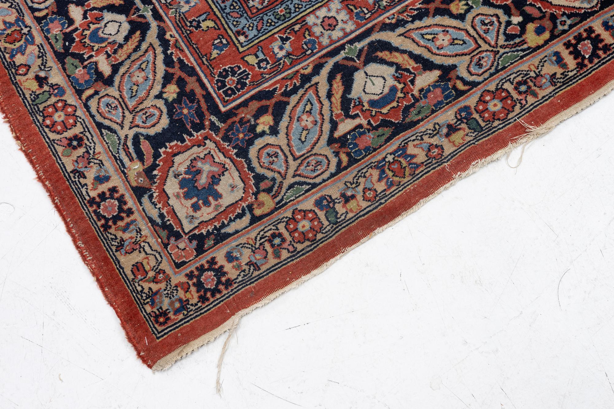 An oriental carpet, c. 370 x 275 cm.