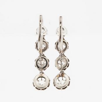 Earrings, a pair of 950 platinum set with old-cut diamonds.