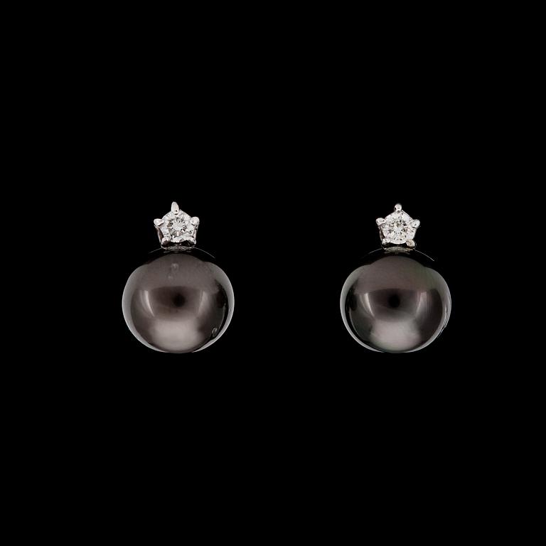 A pair of Tahiti pearl, 11,8 mm, and diamond earrings.