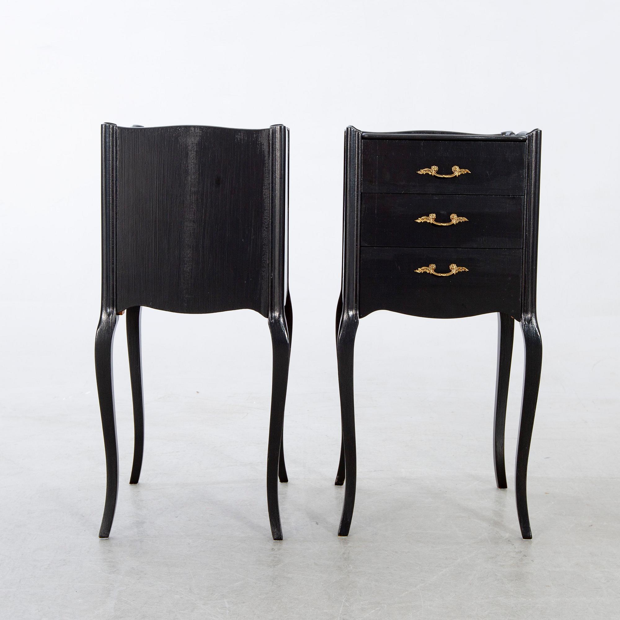 A pair of Rococo-style bedside tables later part of the 20th century.