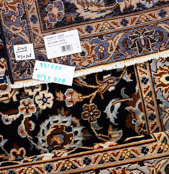 A Kashan carpet, c. 413 x 308 cm.