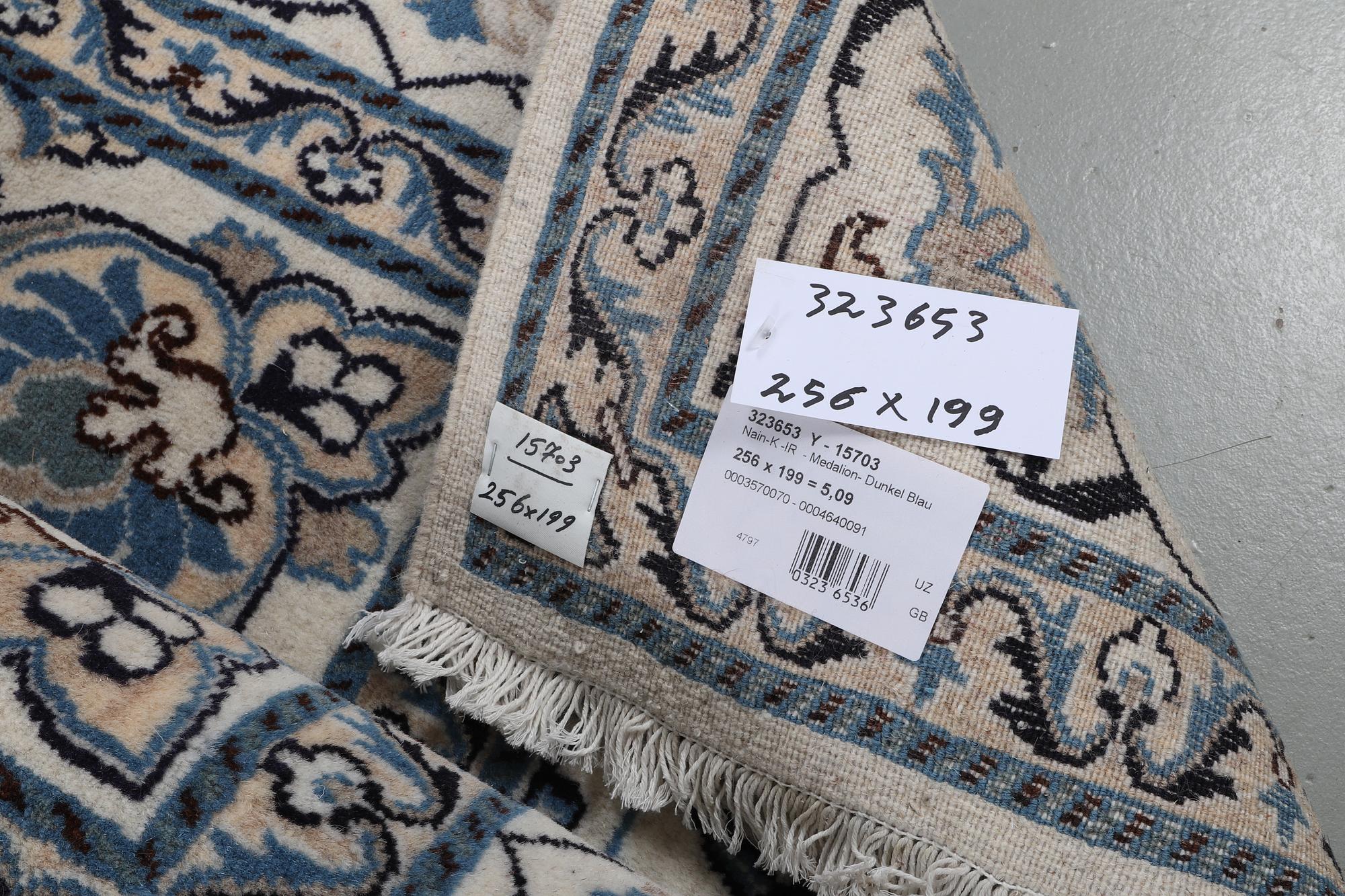 A carpet, Nain, part silk, ca 256 x 199 cm.