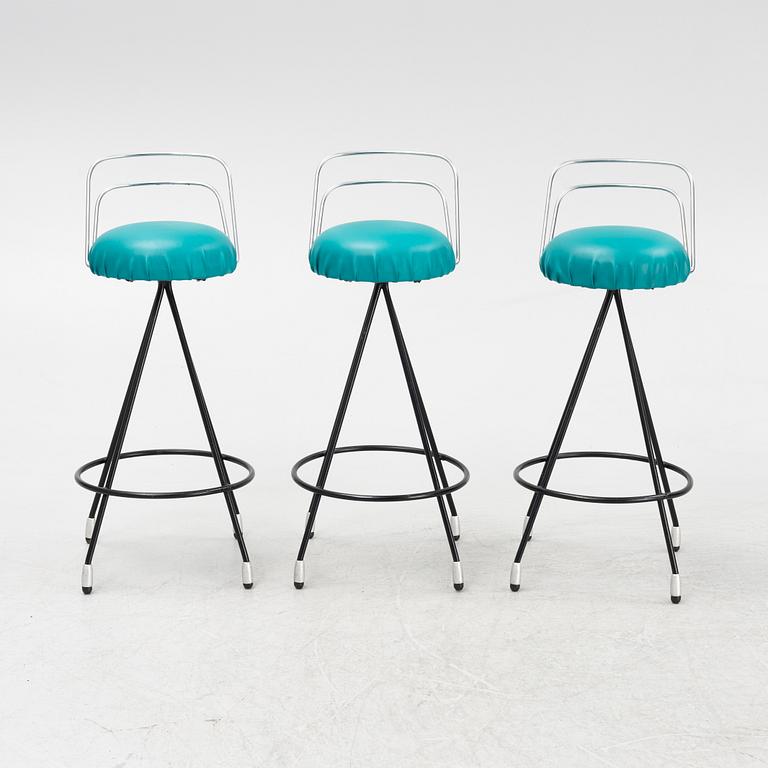 A Bar with three barstools, 1970's.