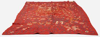 An embroided wool bed cover of 'fall of man' design, South west Scania, Sweden, first half of the 19th century.