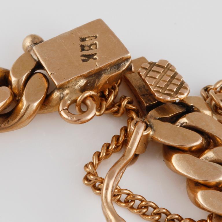 ARMLÄNK, 18K guld. Vikt 34,8 gram.