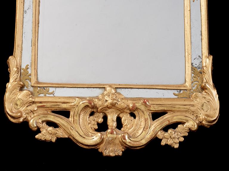 A Swedish Rococo 18th century mirror, dated 1769.