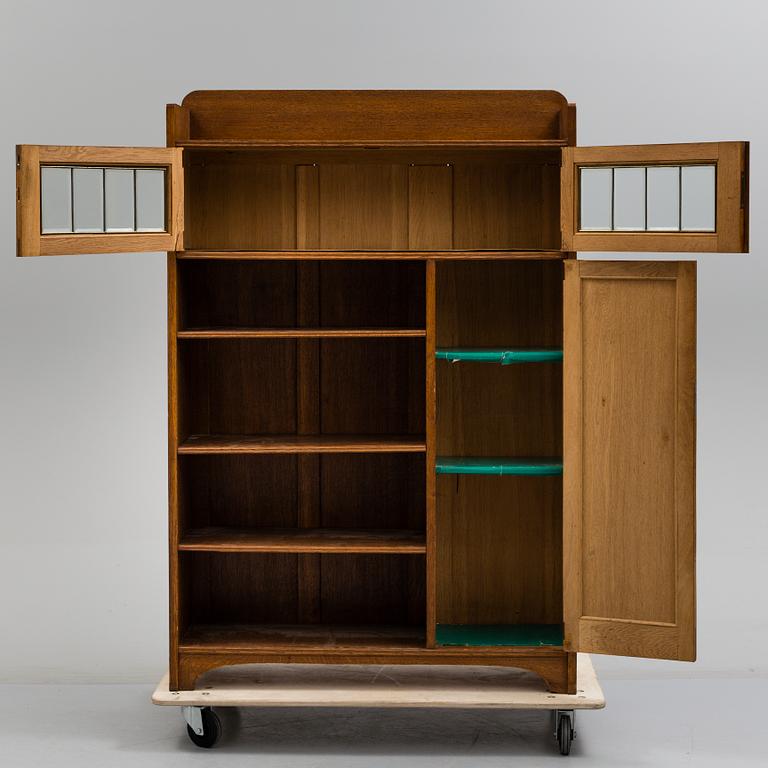 A early 20th century Jugend Cabinet veneered with oak.