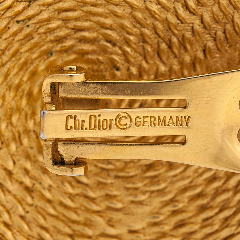 Dior, a necklace and a pair o earrings, both gold coloured metal. Marked  Chr. Dior and Chr. Dior Germany. 1980s.