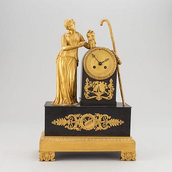 A French Empire pendulum clock, first half of the 19th century.