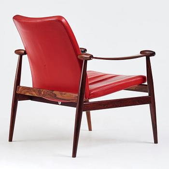 Finn Juhl, a model 133 rosewood easy chair from France & Son, Denmark.