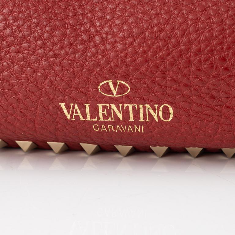 Valentino Gravani, a red leather studded tote bag, 2018.