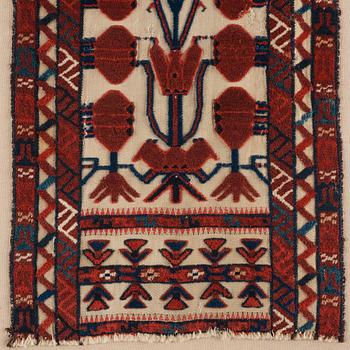 A TENT BAND, FRAGMENT, an antique Turkmen, Czar Russia, ca 102,5 x 39 cm. Framed (with the mounting 107x42 cm).