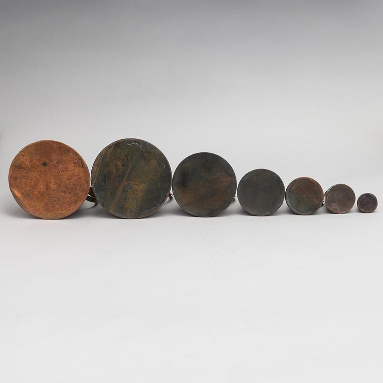 7 Swedish measuring cups from 20th century.