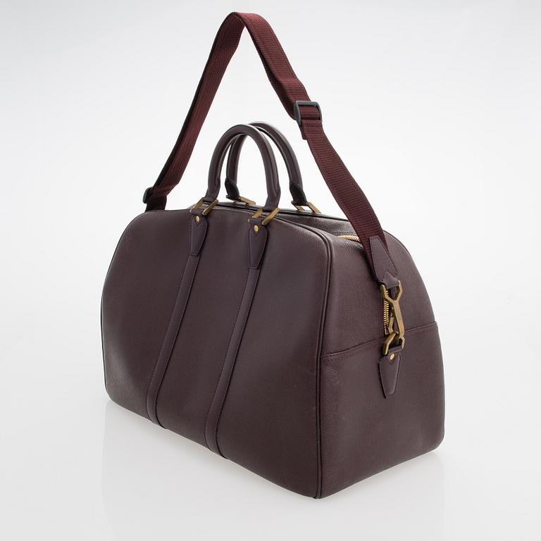 Louis Vuitton, 'Taiga Kendall PM' Bag.