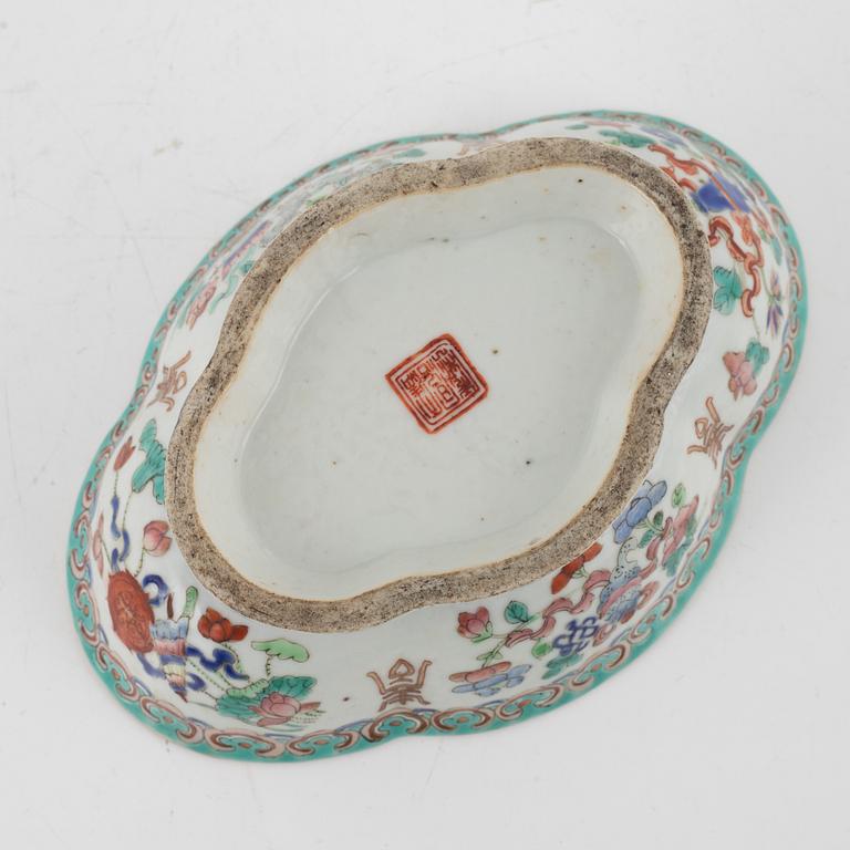 A set of four Chinese Export plates, 18th Century and a bowl, late 19th Century.