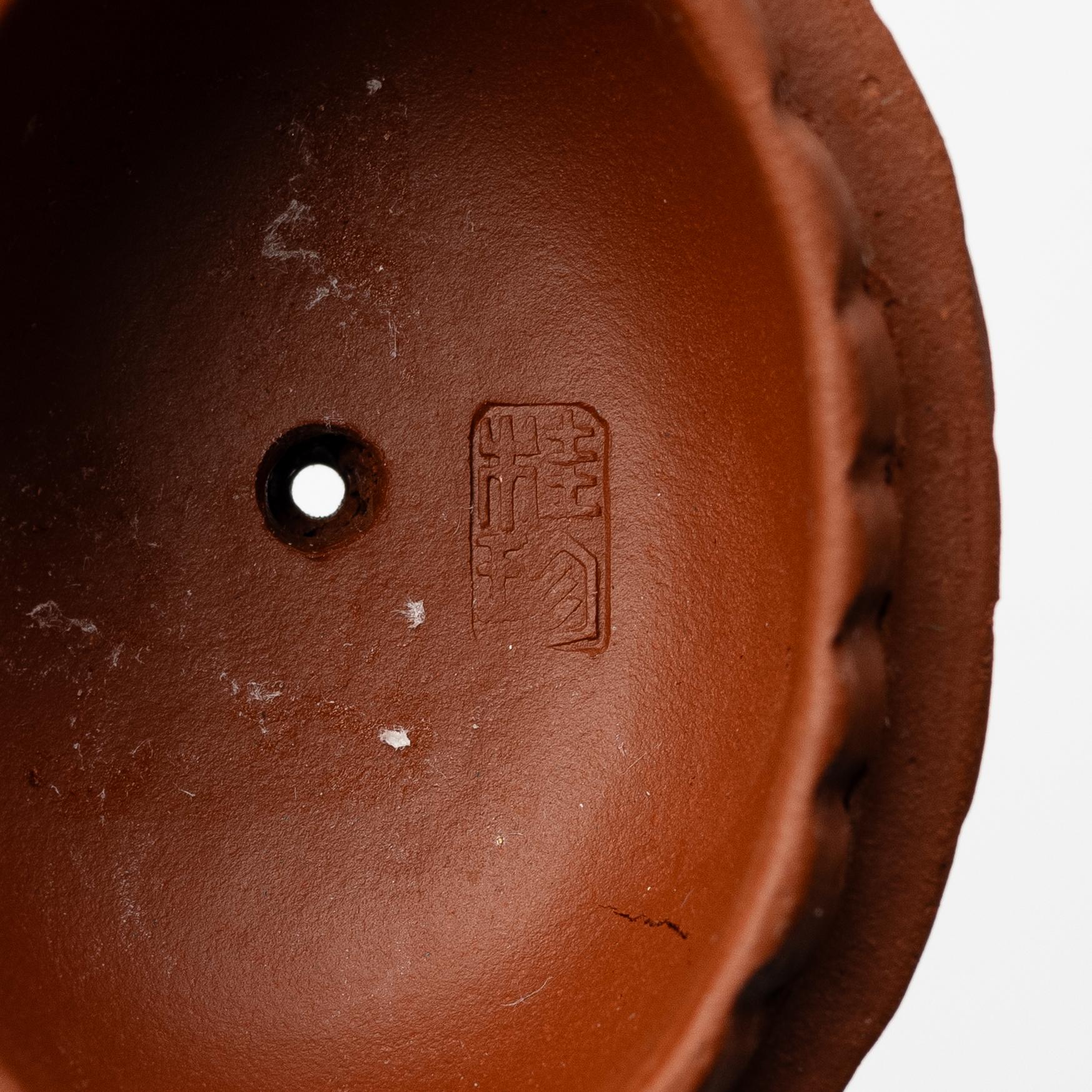 Zhou Guizhen, A Chinese yixing 'chrysanthemum' teapot, 1980/90s.