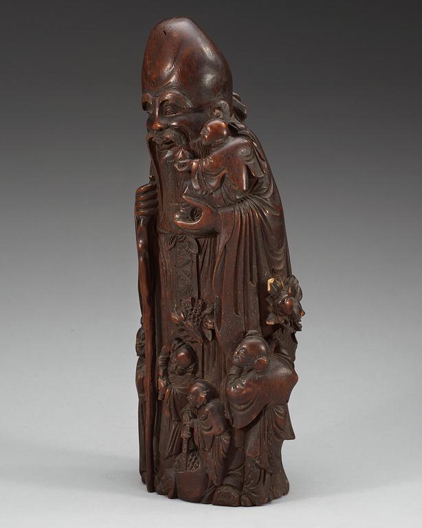 A bamboo figure of Shoulao, Qing dynasty, 19th Century.