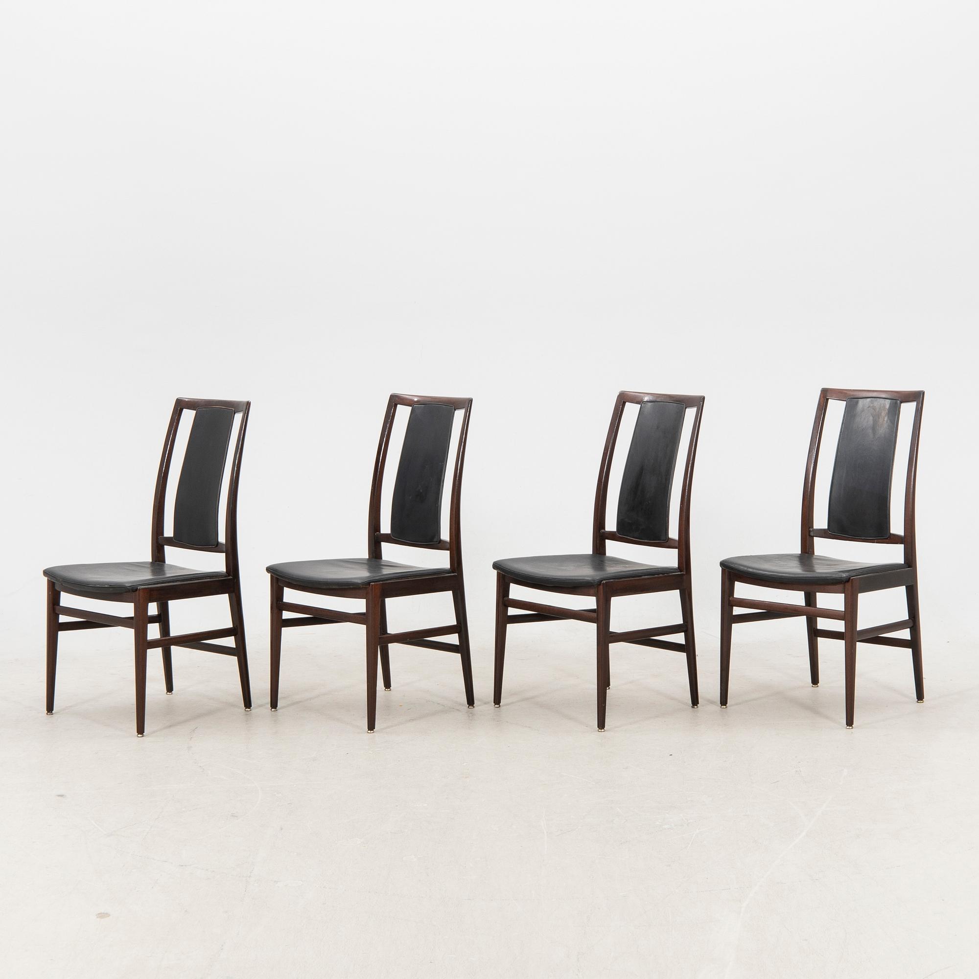 A table and four chairs in lacquered mahogany by David Rosén, "Triva-diné", middle of the 20th century.