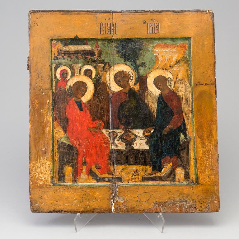 A Russian 19th century icon depicting the Holy Trinity, tempera on wood.