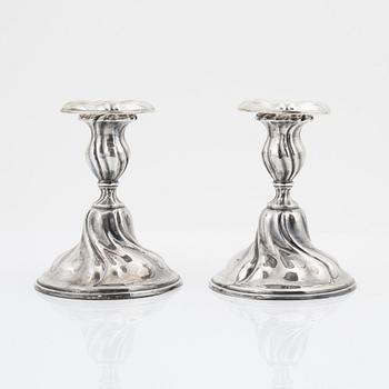 A pair of Rococo style silver candlesticks, Norway, bearing Swedish import marks, 1937.