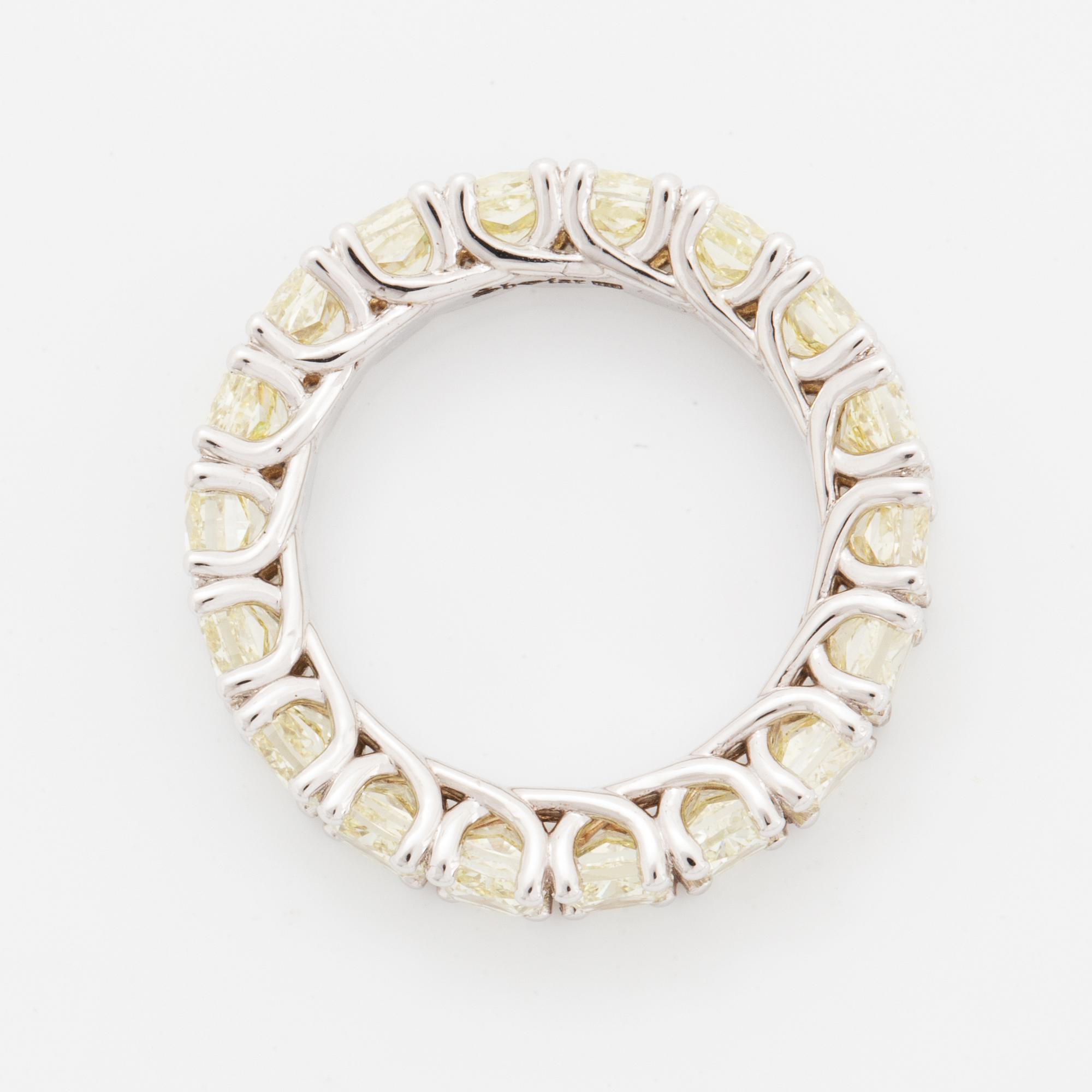 Cuschion-cut diamond eternity ring.