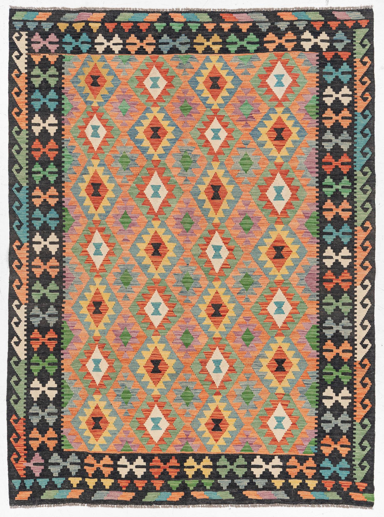 A kilim carpet, ca 251 x 188 cm.