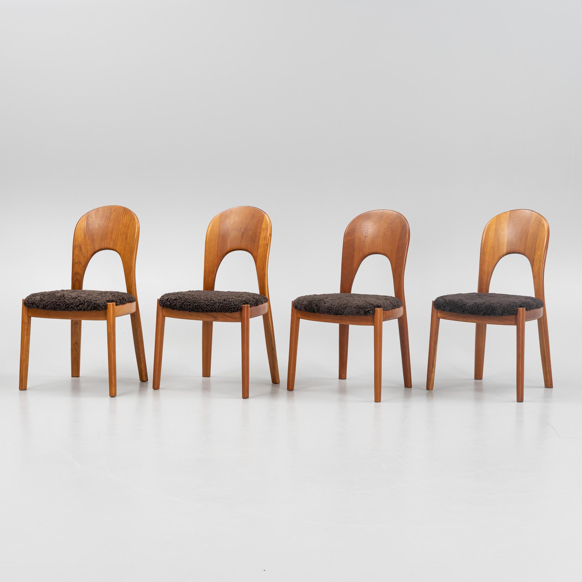 Niels Koefoed, eight teak dining chairs upholstered in new sheep skin, Denmark, 1960's.