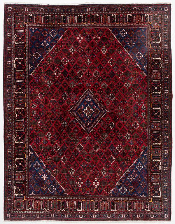 An oriental rug, c. 365 x 285 cm.