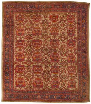 469. A CARPET. An antique Ushak. 554,5 x 480 cm.