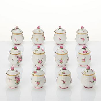 A set of 12 Swedish Marieberg custard cups with covers, 18th century.