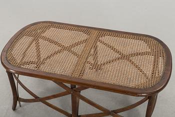 A wooden sofa, a table and four chairs, later part of the 20th century.