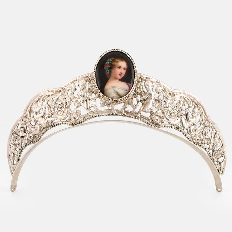 A silver and miniatyre portrait on porcelain tiara.