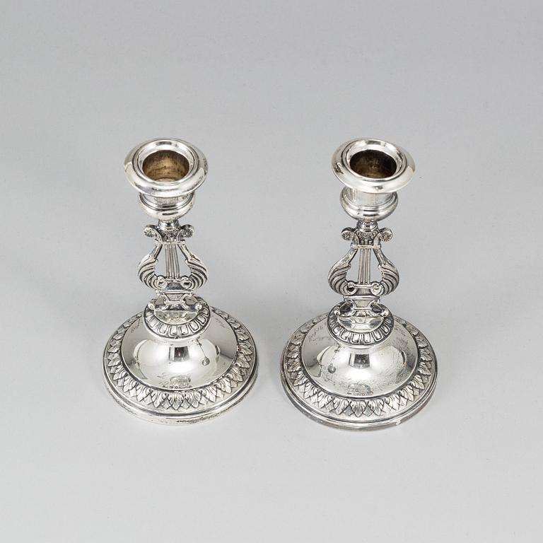 A pair of silver candlesticks by GAB, Stockholm, 1909.