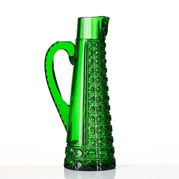 A glass service, a decanter with stopper and six glasses, also a pitcher, 20th century.