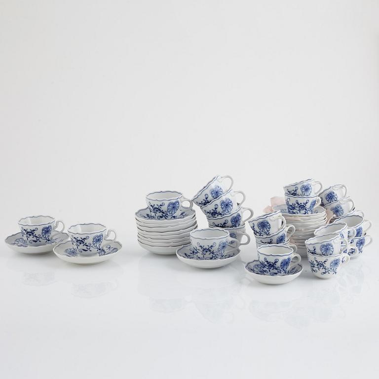 A Meissen Dining and Coffee Service, "Onion Pattern", (90 pieces).