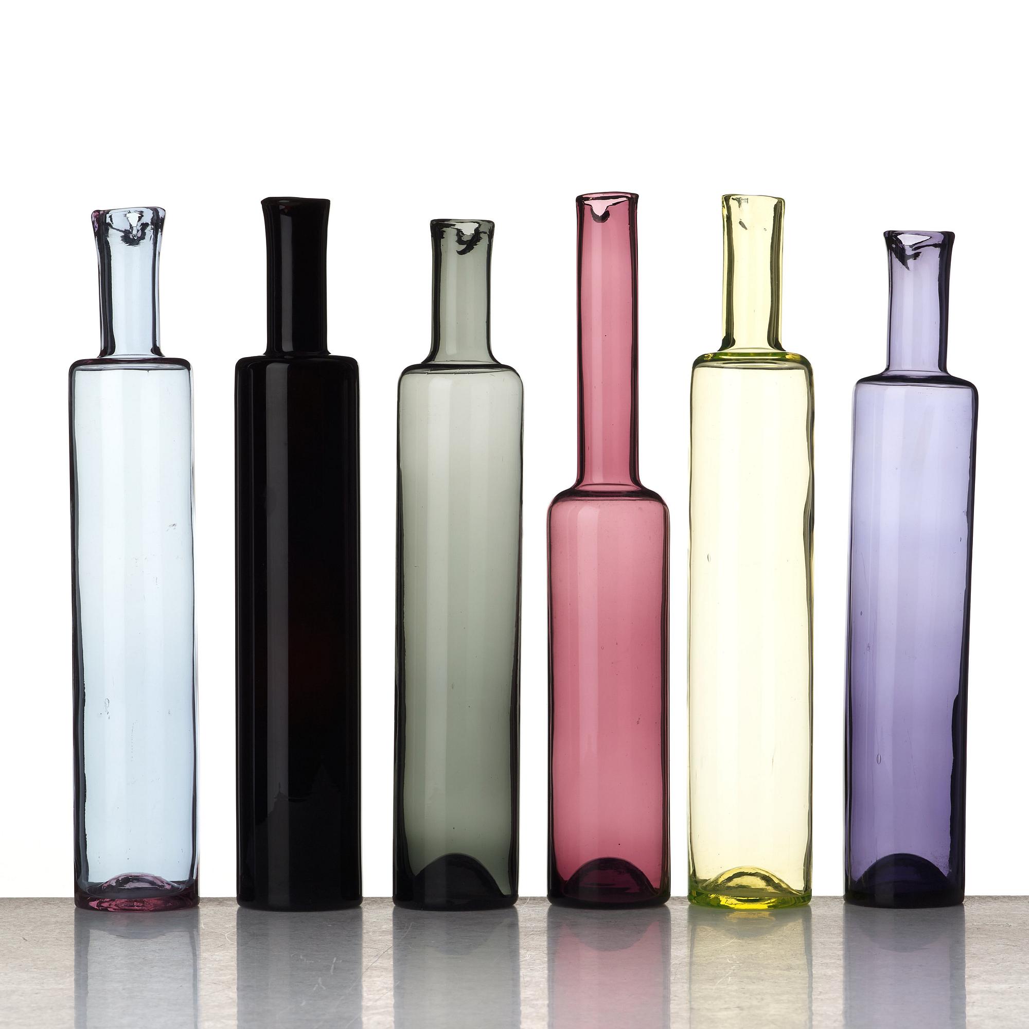 Nanny Still, a set of six different coloured glass bottles/vases, Riihimäen Lasi Oy, Finland, mid 20th century.