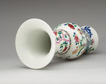 A famille rose vase, Qing dynasty, 19th Century, with Kangxis six character mark.