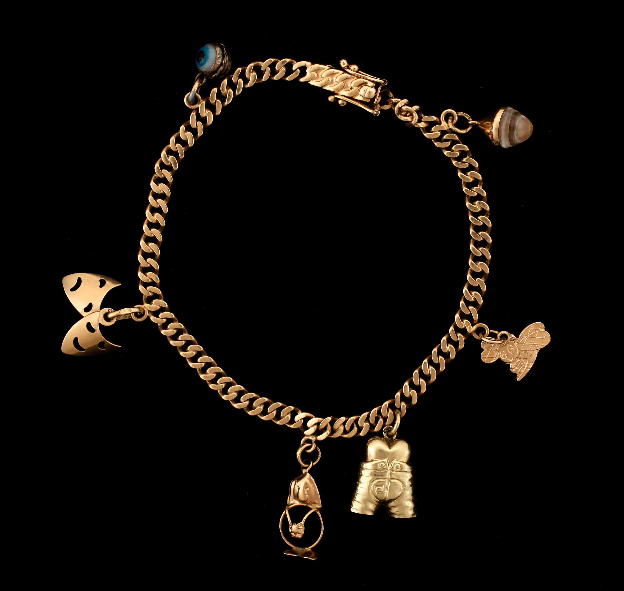 PARTI GULD, 14 samt 18 k guld. Totalvikt ca 23g.