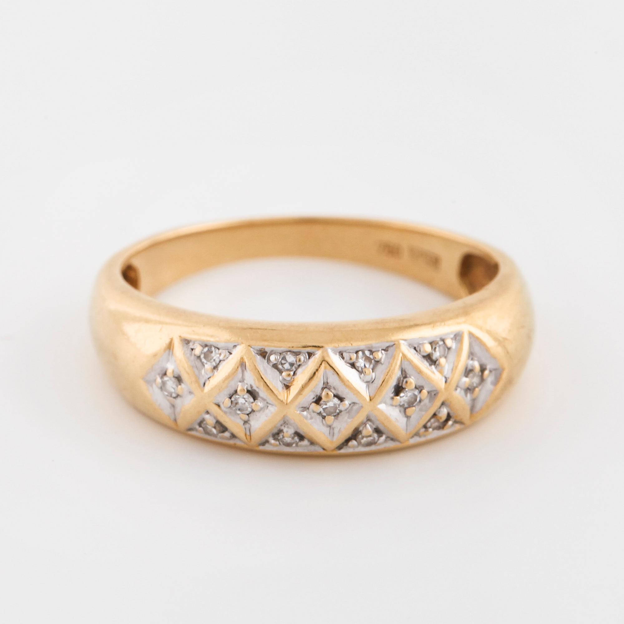 A single cut diamond ring.