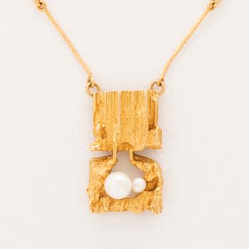 An 18K gold necklace by Björn Weckström set with cultured pearls, for Lapponia.
