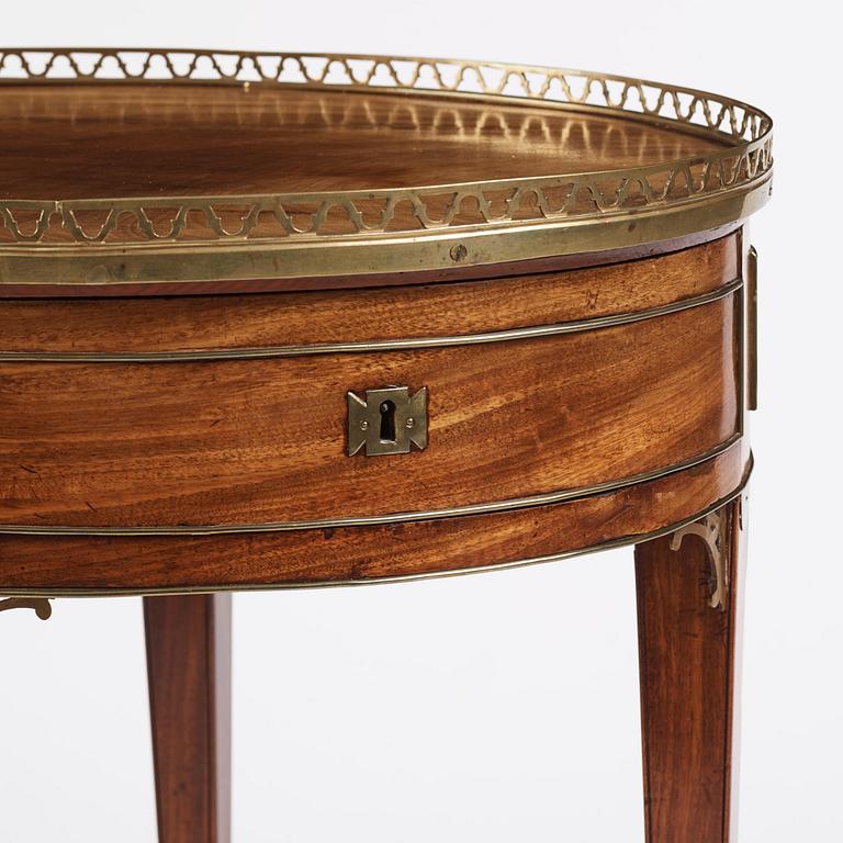 A late Gustavian mahogany  and gilt-brass table in the manner of C. D. Fick, Stockholm late 18th century.