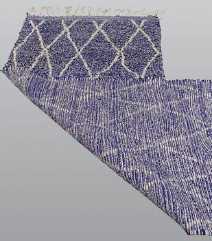 A carpet, Morocco, ca 240 x 104 cm.