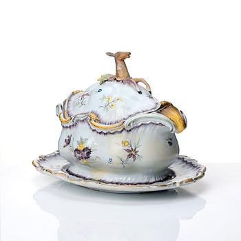 A Swedish Rörstrand faience tureen with cover and stand, 18th Century.