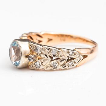 RING, 14K guld, diamanter ca 0.18 ct tot och topas.