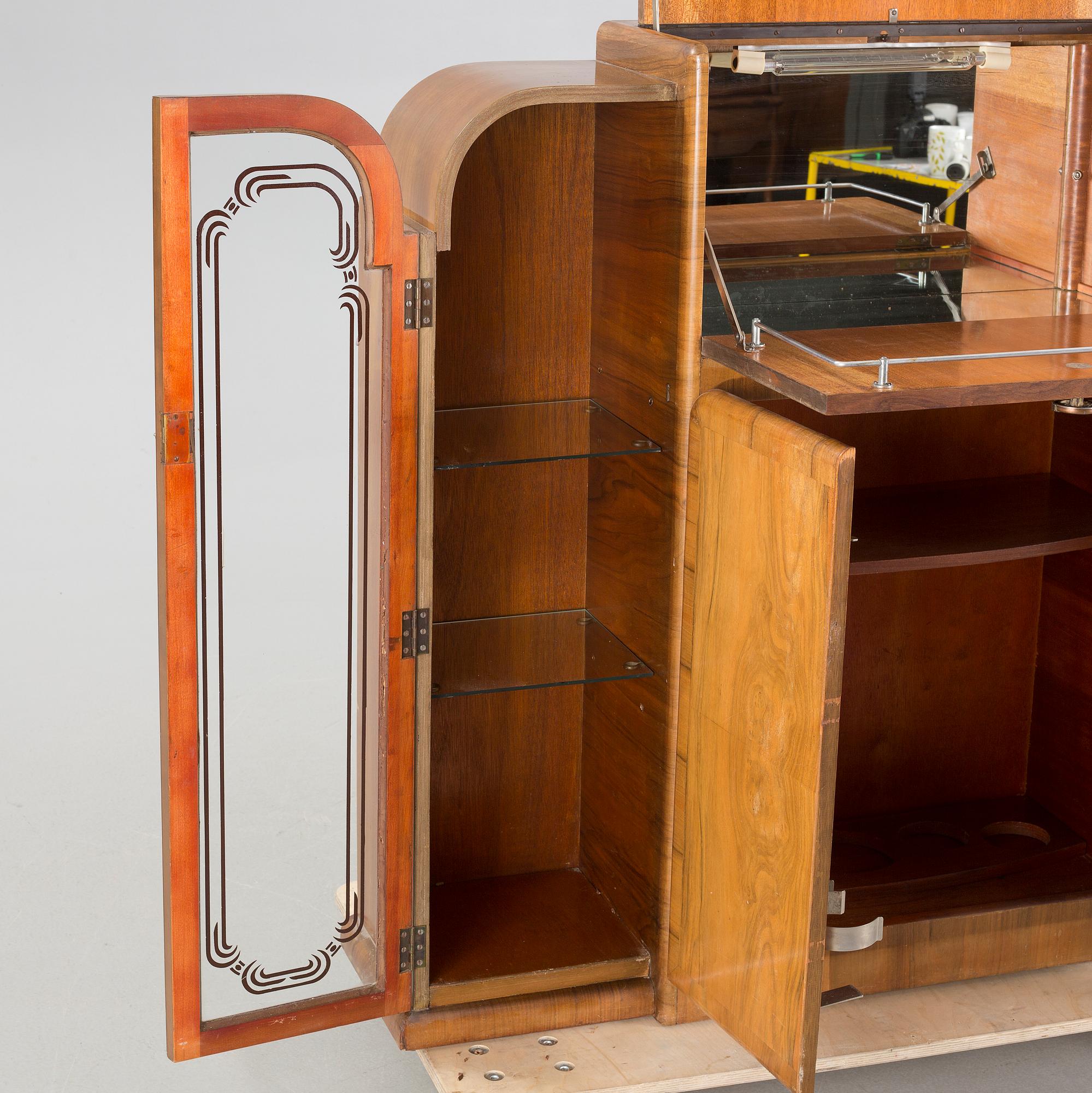 A 1960s "Mayfair" cocktail cabinet by Rivington, England.