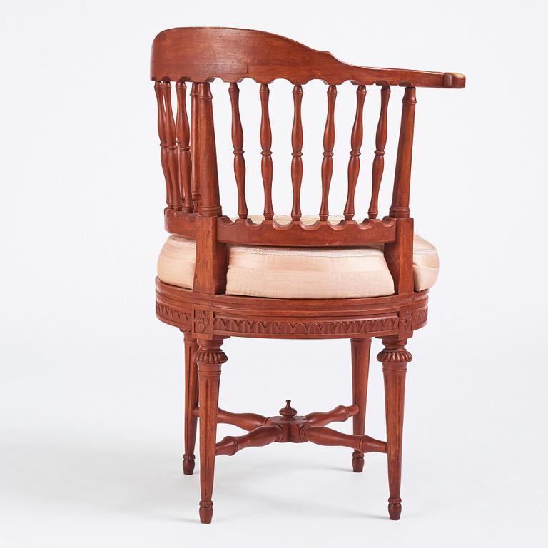 A carved Gustavian commode chair by J. Hammarström (master 1794-1812).